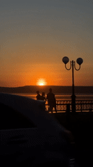 Orange sunset captured over lake in Votkinsk, Russia