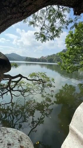 Early morning lakeside moments captured at Kandy Lake, Sri Lanka