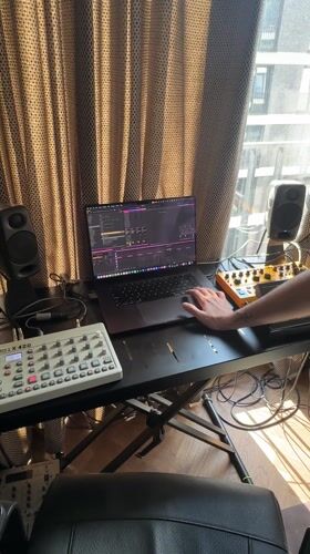 Music production session captured in Berlin home studio