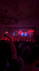 Indoor concert draws large crowd with dynamic lighting