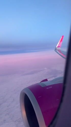 Passenger documents aerial views during commercial flight over coastline
