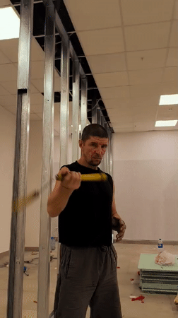 Nunchaku practice inside unfinished Qarağandı government building