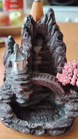 Backflow incense burner filmed up close in a Kyiv home