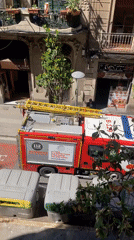 Fire Engine 'BOMBERS 112' Parked on City Street