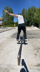 Skateboarding tricks at a concrete park in Divnogorsk