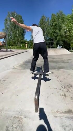 Skateboarding tricks at a concrete park in Divnogorsk