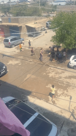 Summer water fight breaks out on a Metsamor street
