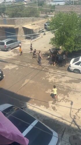 Summer water fight breaks out on a Metsamor street