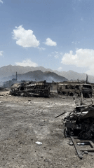 Destruction scene with burned vehicles documented in Quetta