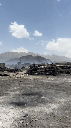 Destruction scene with burned vehicles documented in Quetta