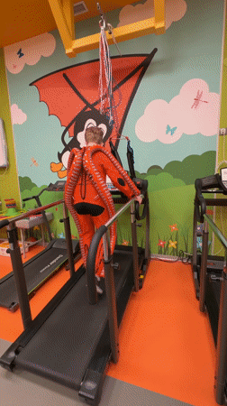 Children undergo specialized therapy in distinctive suits at Izhevsk center