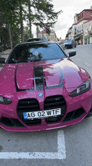 Pink BMW M4 with racing stripes spotted across Veliko Tarnovo