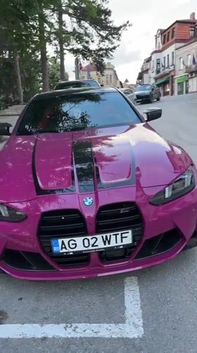 Pink BMW M4 with racing stripes spotted across Veliko Tarnovo