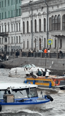 Routine urban life captured across Saint Petersburg waterways and streets