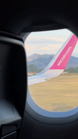 Wizz Air passenger documents flight views near Montenegro airport
