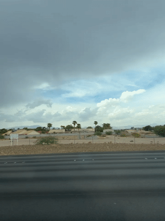 Rolling through suburban Nevada highway on a cloudy afternoon