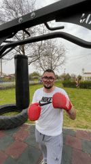 Man trains with punching bag at playground in Polski Izvor
