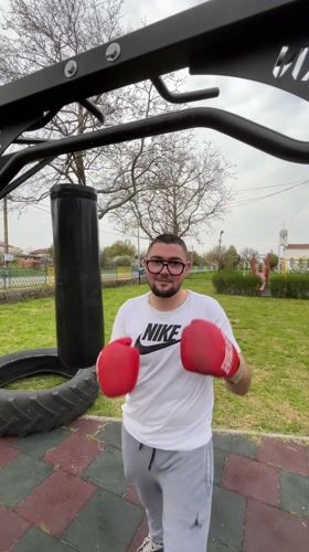 Man trains with punching bag at playground in Polski Izvor