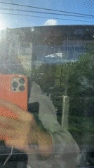 Morning train journey recorded under clear skies in London