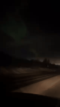 Dashcam captures nighttime winter driving conditions in Apatity, Russia