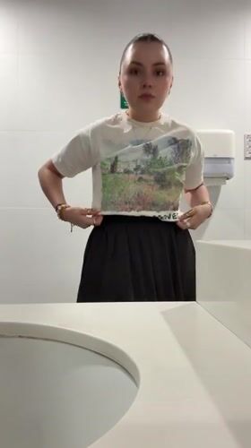 Woman takes bathroom selfies in Mexico City late night