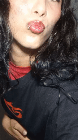 Woman documents selfie session indoors in Porlamar, Venezuela