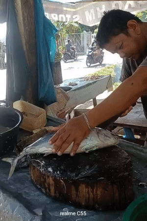 Early morning fish preparation at Lhokseumawe seafood market