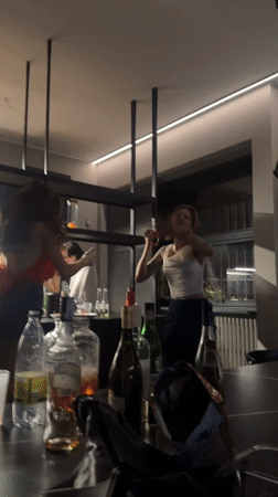 Low-key evening gathering in a Milan living room