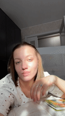 Woman's quiet morning routine documented in Reshetnikovo, Russia