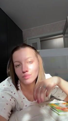 Woman's quiet morning routine documented in Reshetnikovo, Russia