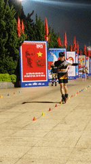 Inline skaters perform nighttime stunts in Da Lat, Vietnam