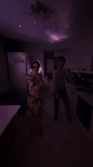 Kitchen dance party with colored lights captured in Sochi