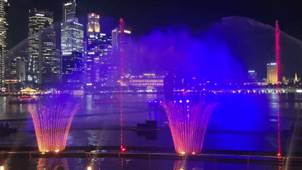 Colorful fountain show lights up Singapore skyline at night