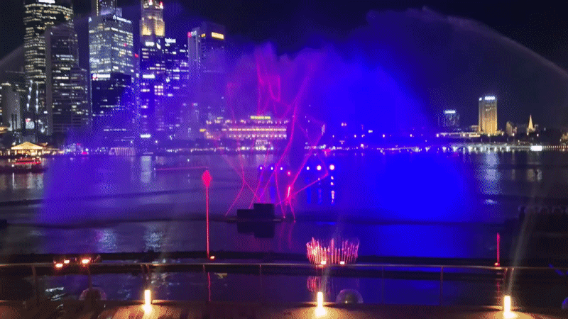 Colorful fountain show lights up Singapore skyline at night