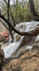 Waterfall flows near historic Bachkovo Monastery, Bulgaria