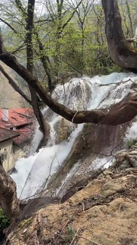Waterfall flows near historic Bachkovo Monastery, Bulgaria