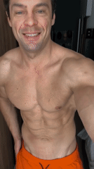 Man takes shirtless selfies in Moscow bedroom