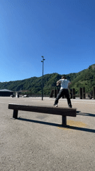 Bench tricks at a riverside skate spot in Divnogorsk