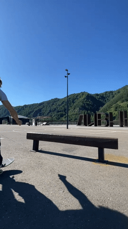 Bench tricks at a riverside skate spot in Divnogorsk