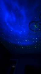 Projector creates starry nebula light show in Russian bedroom