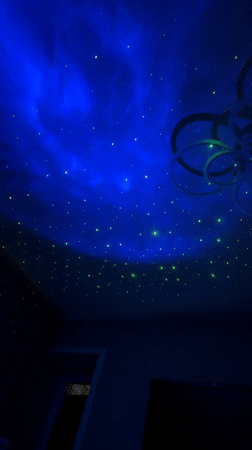 Projector creates starry nebula light show in Russian bedroom