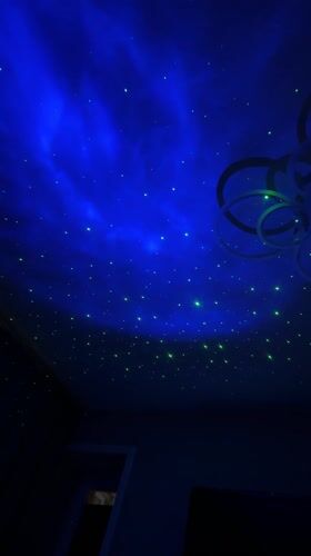 Projector creates starry nebula light show in Russian bedroom