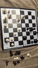 Chess board with pieces on a textured brown surface