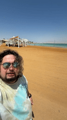 Tourist takes selfies at Dead Sea resort area