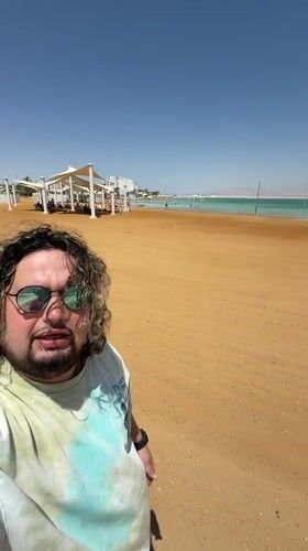 Tourist takes selfies at Dead Sea resort area