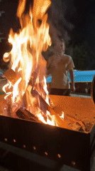 Evening backyard gathering with fire pit in Bulgarian village