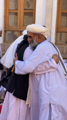 Traditional community gathering observed in Kandahar courtyard