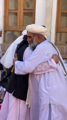 Traditional community gathering observed in Kandahar courtyard