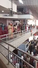 Large crowd gathers in church or hall in Nigeria