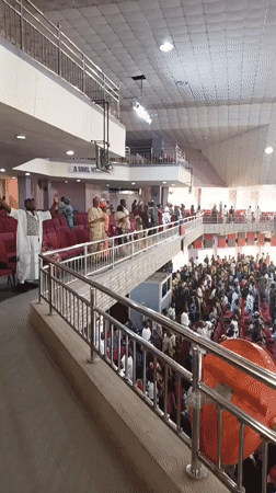 Large crowd gathers in church or hall in Nigeria